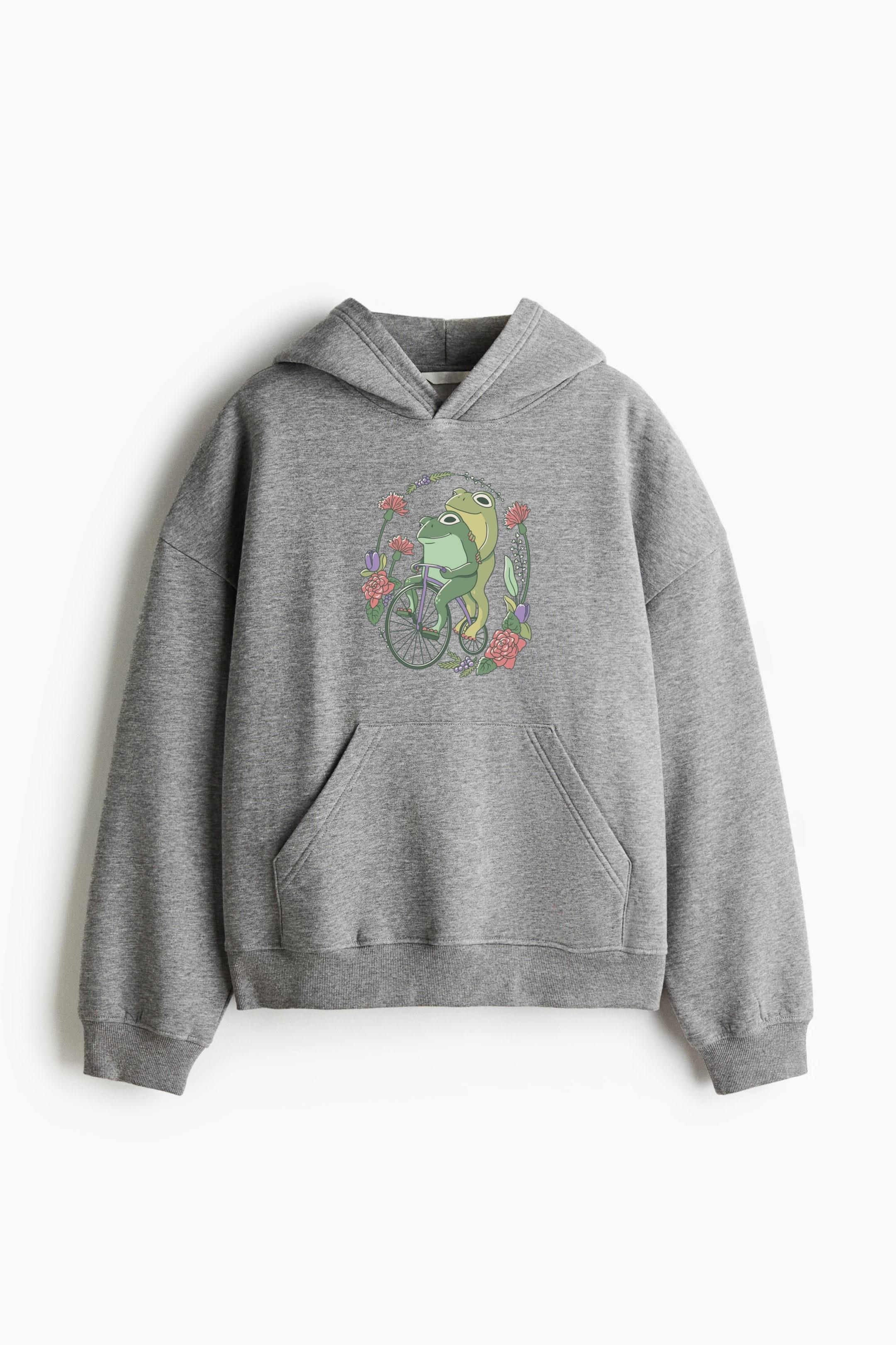 Two Frogs Riding A Bicycle Surrounded By Flowers Loose-Fit Printed Hoodie